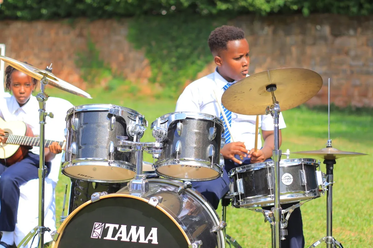 Student Drumming Performance at Kigwa Ridge School